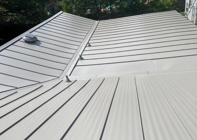 Solar attic fan installed on a metal roof for Roof Ventilation in Gold Canyon